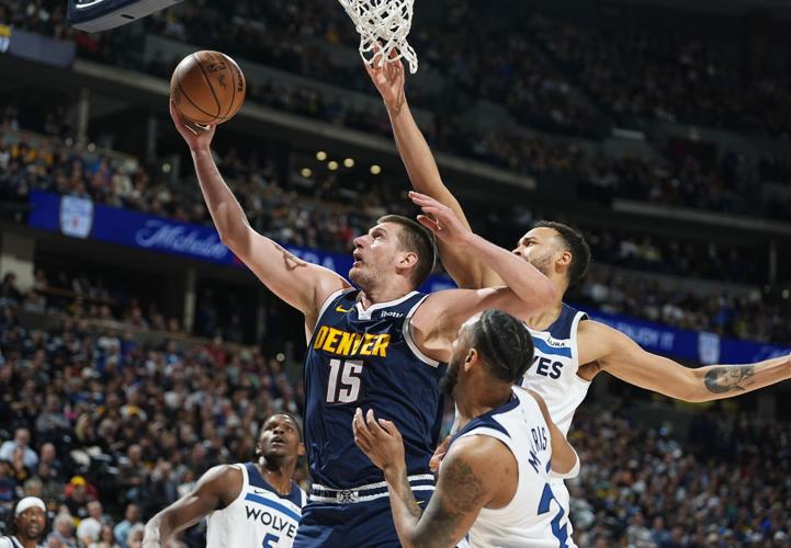 Nikola Jokic Leads Denver Nuggets to Western Conference Summit with Victory Over Minnesota Timberwolves in NBA Clash.