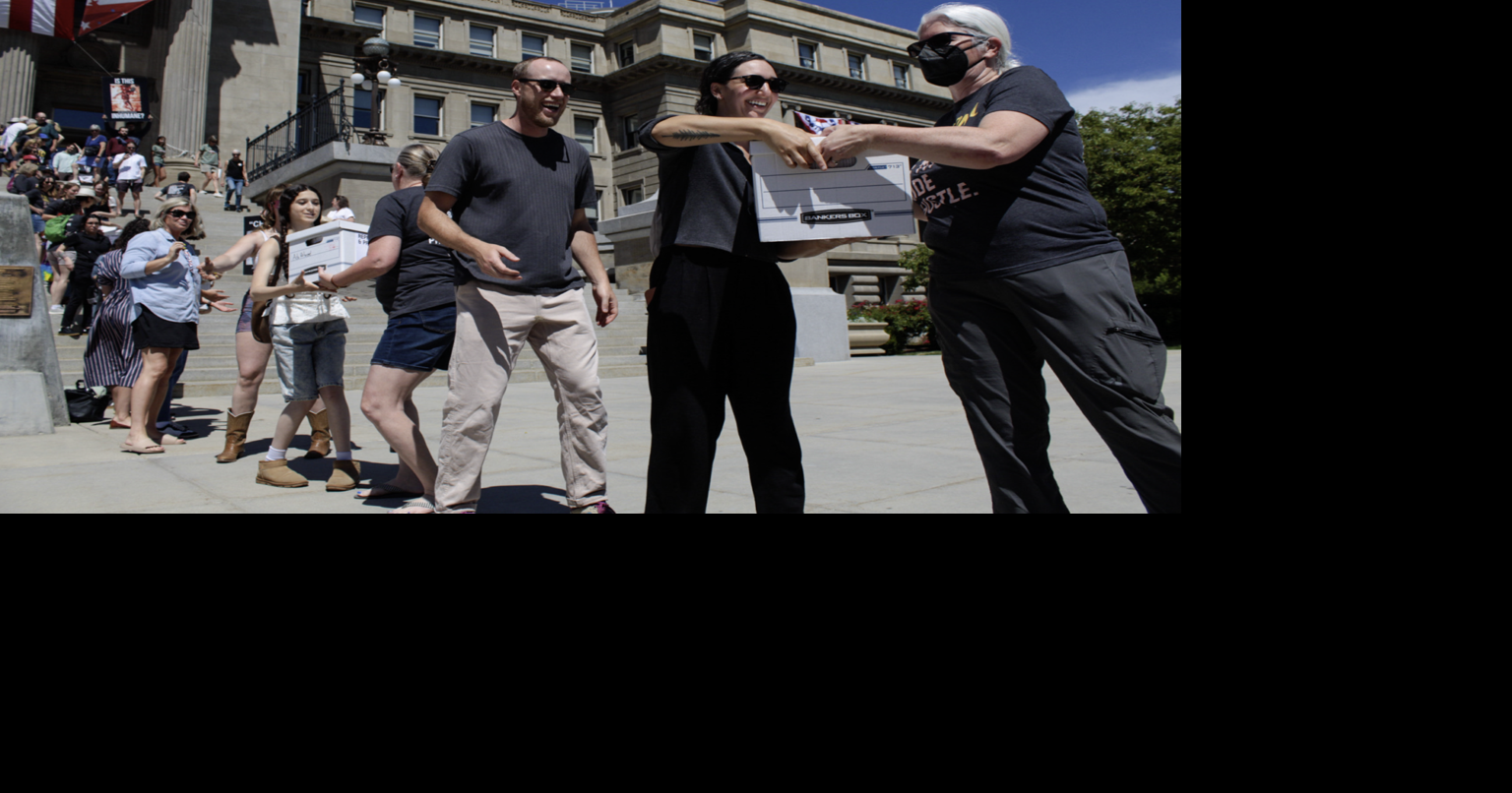 Supporters of ballot measure to end Idaho’s strict abortion ban turn in nearly 110K signatures