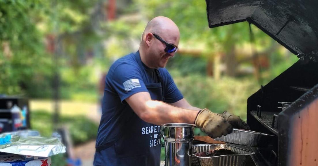 SECRETARY OF STEAK: Idaho Secretary of State Phil McGrane balances ballots and barbecue smoke