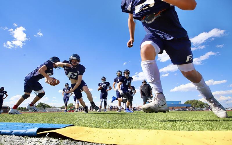 PREP FOOTBALL PREVIEWS Armed with a new, but very familiar coach, West