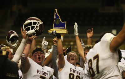football rigby state trojans championship alene coeur double postregister brycen lifts trophy defeated 5a after
