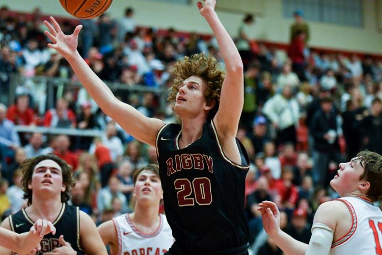 Caleb Fullmer HIGH SCHOOL BOYS BASKETBALL: Madison's team effort prevails in rivalry