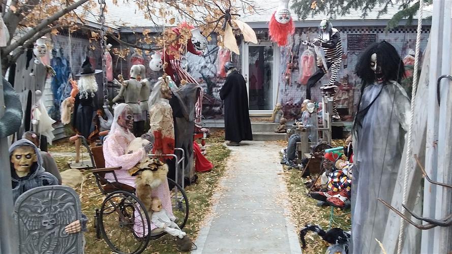 Halloween celebrants laugh and scream at Hoover’s House of Horrors in