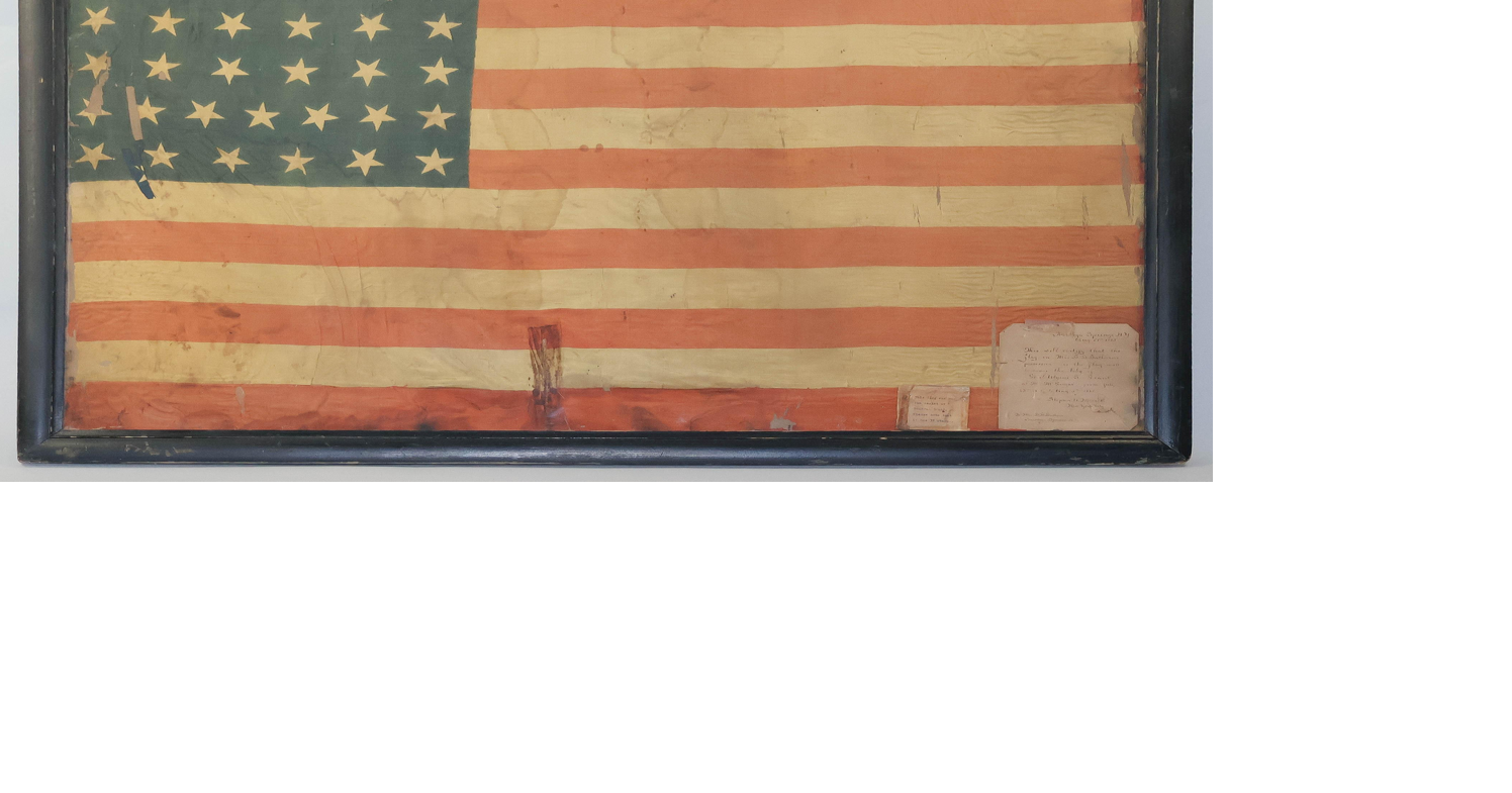 Grant Cottage wins bid to bring funeral flag home