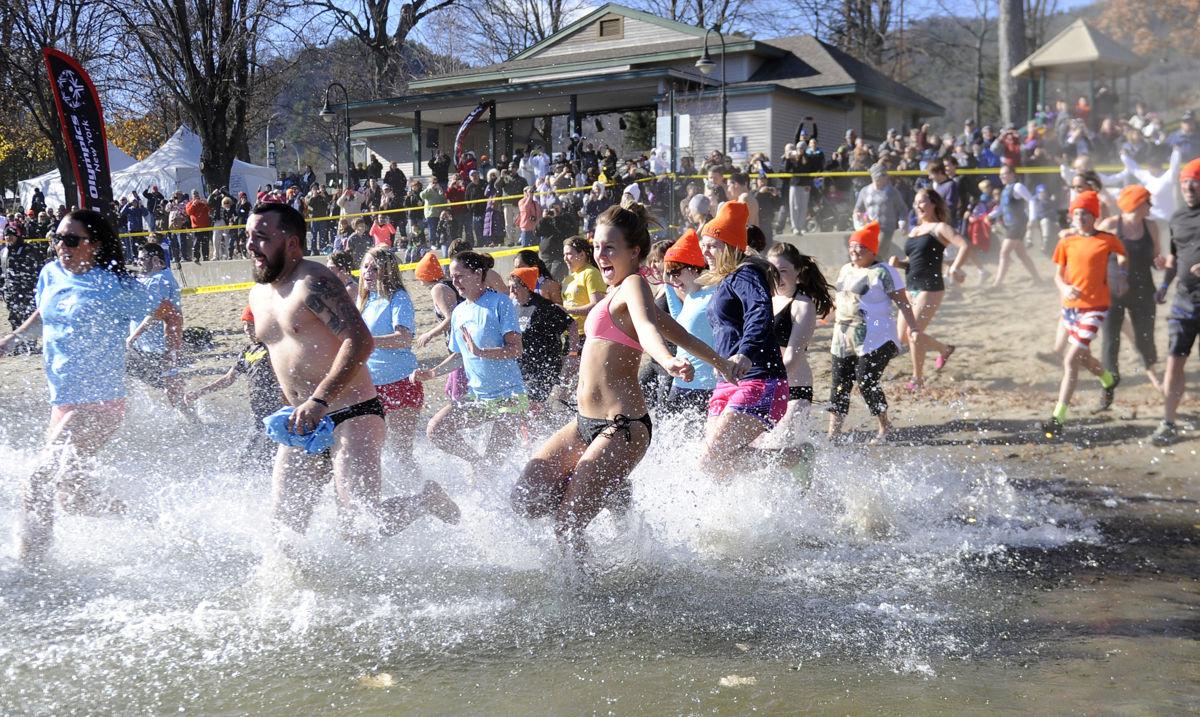 Polar plungers bear cold weather, water for a good cause Local