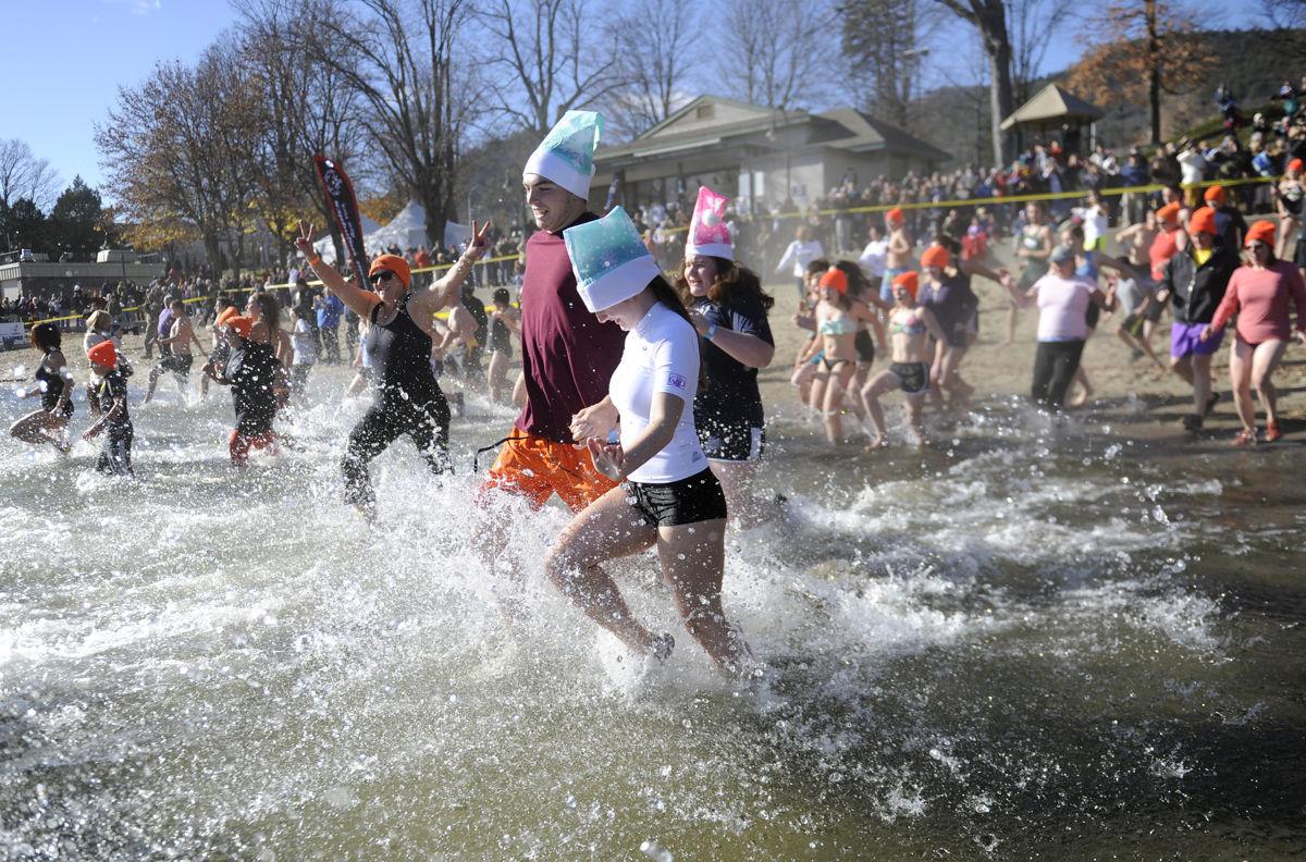 Polar plungers bear cold weather, water for a good cause Local
