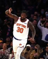 Julius Randle #30 of the New York Knicks celebrates a basket against the Boston Celtics during their game at Madison Square Garden on Jan. 6, 2022, in New York City.