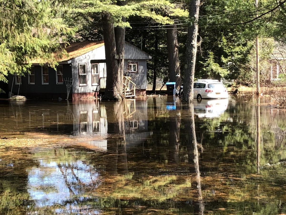 Schroon River flooding endangers homes, roads Local