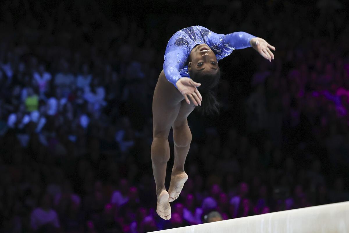 Simone Biles wraps up world gymnastics championships with 2 more