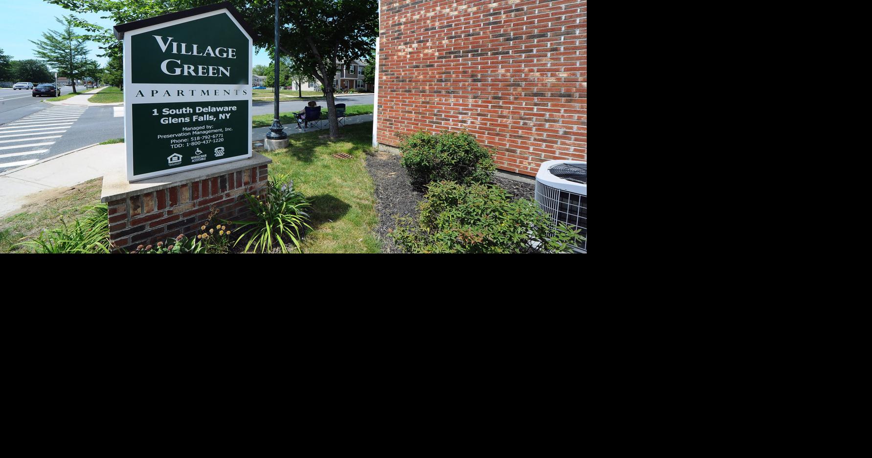 Village Green Apartment tenants express concern about treatment