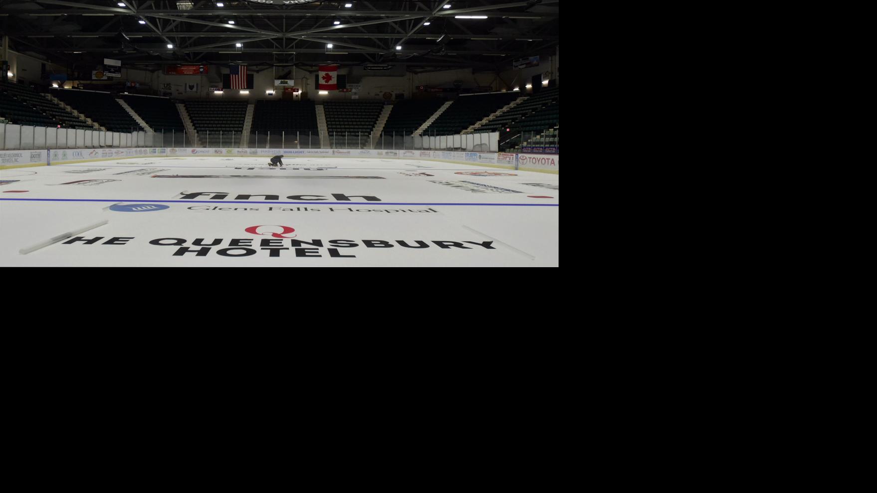 Photos Cool Insuring Arena hockey rink install Photo