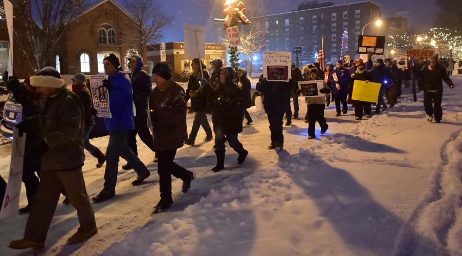 Supporters of impeachment march around City Park