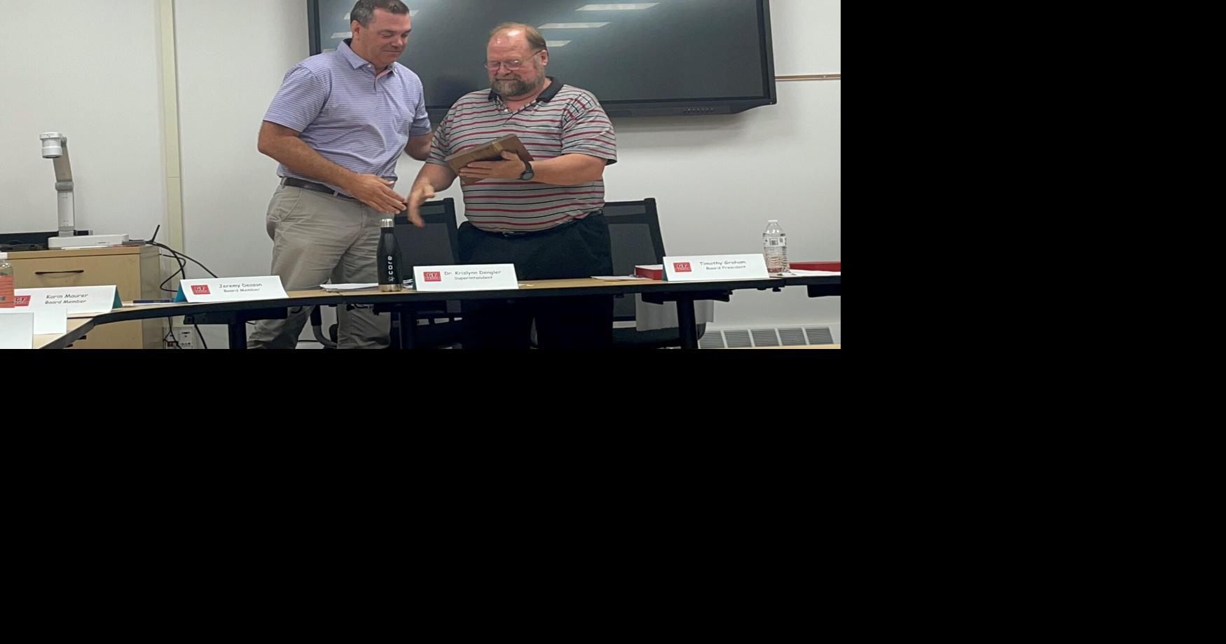 Glens Falls school board member honored at final meeting