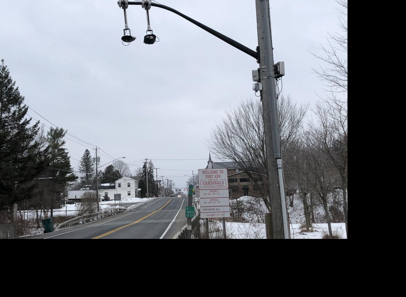 Surveillance cameras dot area roadways recording license plates