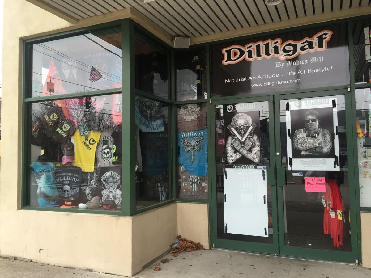 Dilligaf owner removes 'offensive' items from store windows Local