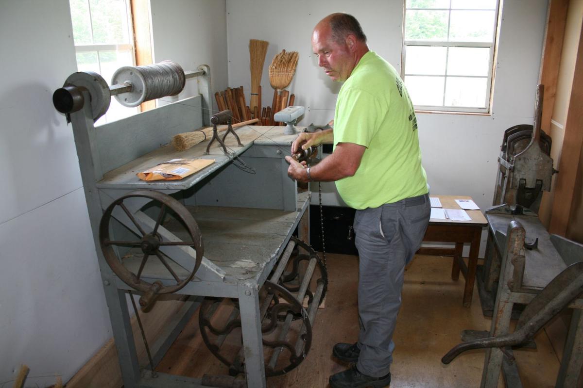 Bruce Caza and broom making machine