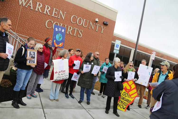 Queensbury rally supports climate change lawsuit against federal government