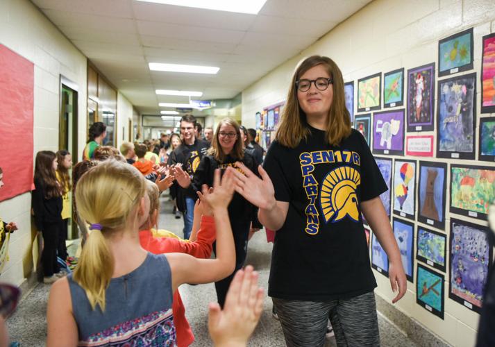 Queensbury High School seniors give back