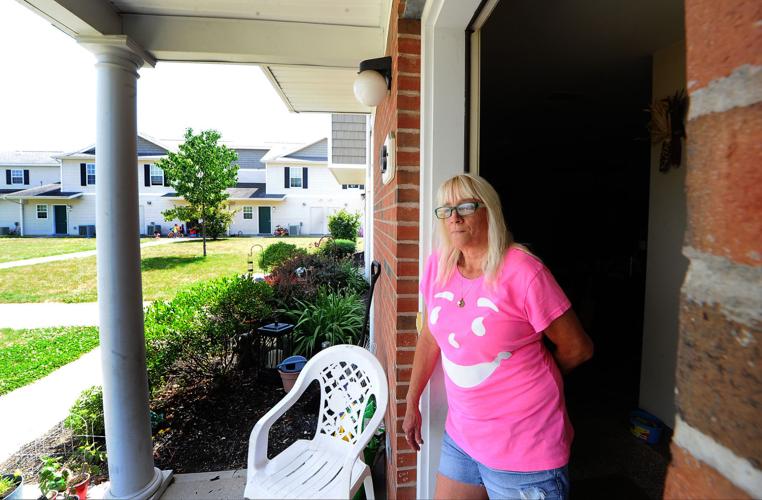 Eight years in, Village Green Apartments complex viewed as successful