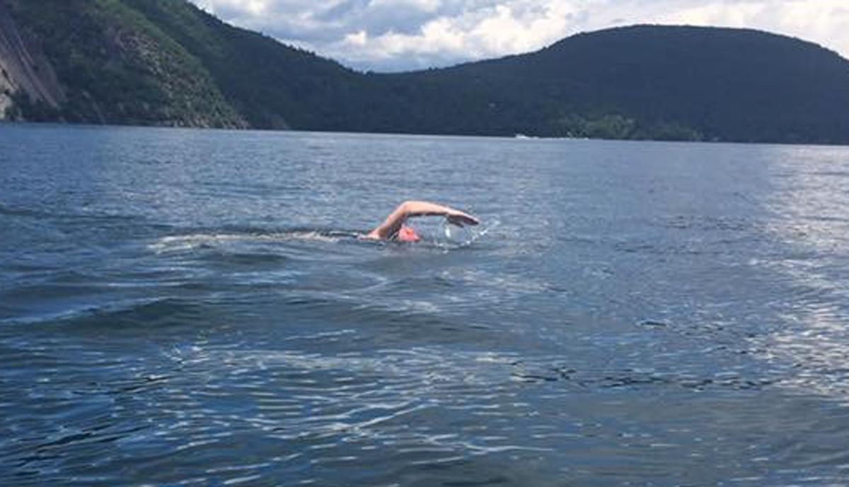 At 49, swimmer basks in glow of swimming length of Lake Local