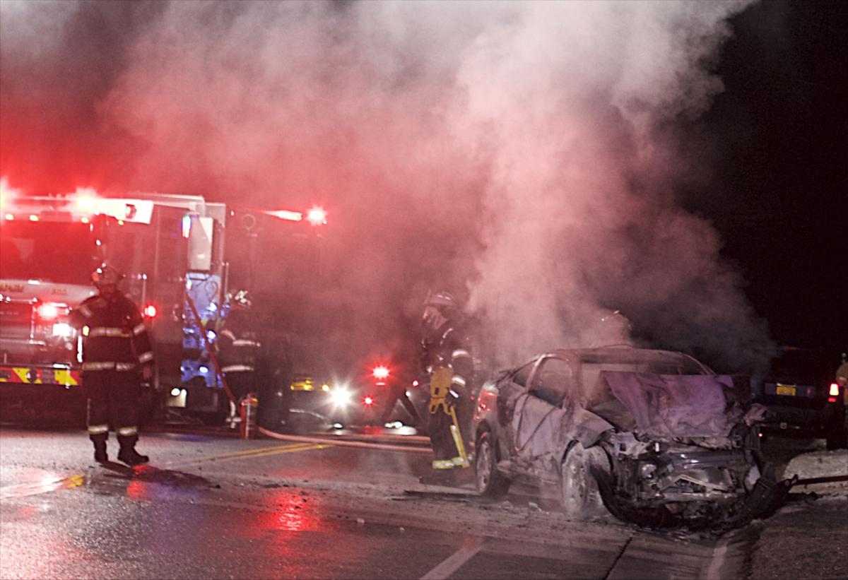 Car bursts into flames after Queensbury crash, one person hurt