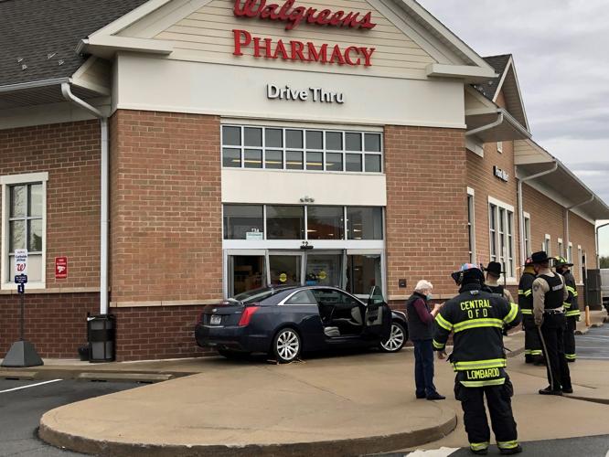 Car crashes into front of Queensbury Walgreens