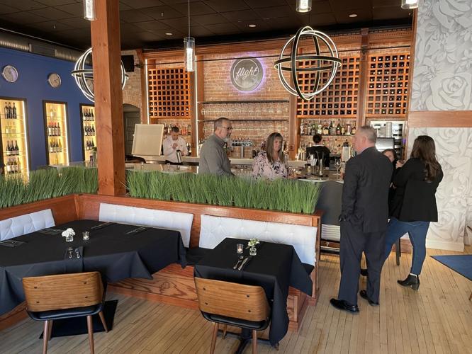 International flavor Flight Wine Bar and Market celebrates with grand