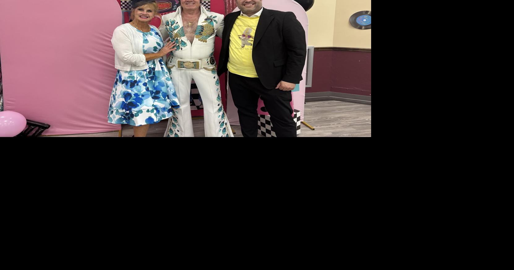 From left)Warren Center Recreation Director Holly Desnoyers, Elvis impersonator Donny Romines and Regional Administrator Moshe Green enjoy festivities at Warren Center in Queensbury on Wednesday