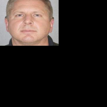 Former police officer charged in gun case