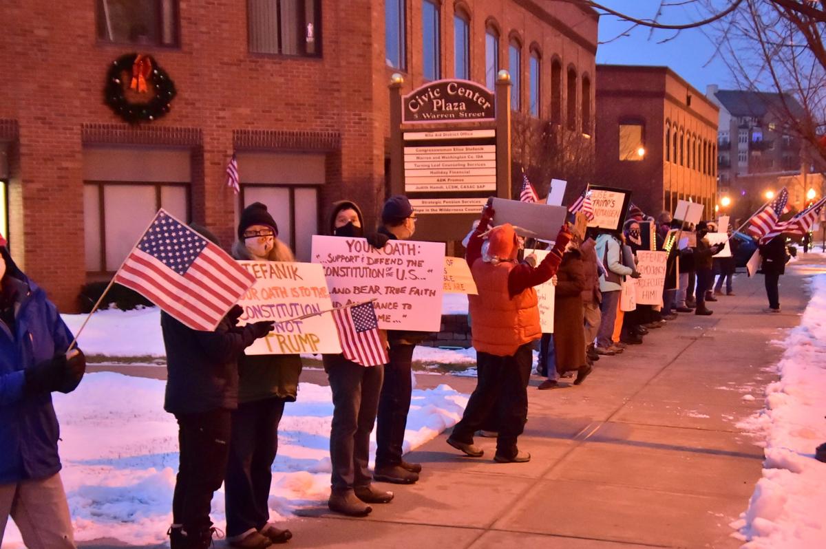 PHOTOS: Group gathers to protest Stefanik's decision on ...