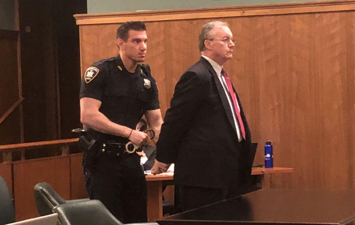 David Decker handcuffed