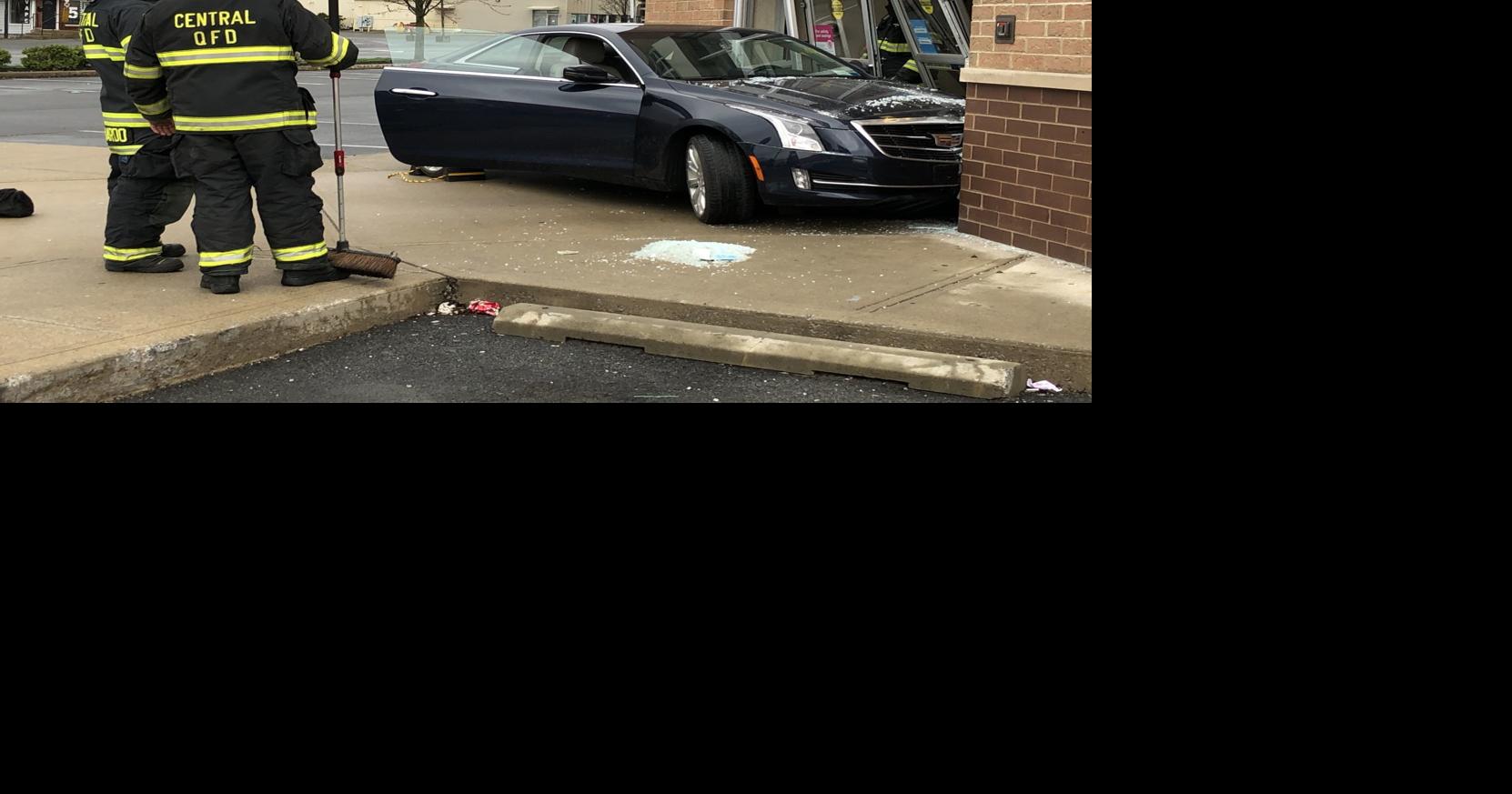 Car crashes into front of Queensbury Walgreens