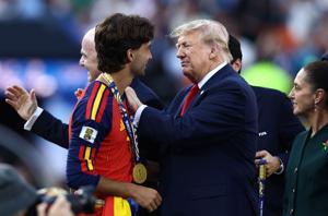 Ferran Torres receives his FIFA World Cup winners medal from President Donald Trump at New York-New Jersey Stadium in East Rutherford