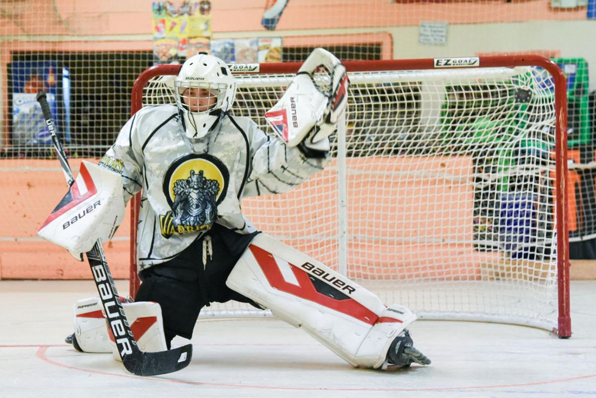 Warriors roller hockey team creates 'family' on wheels High School