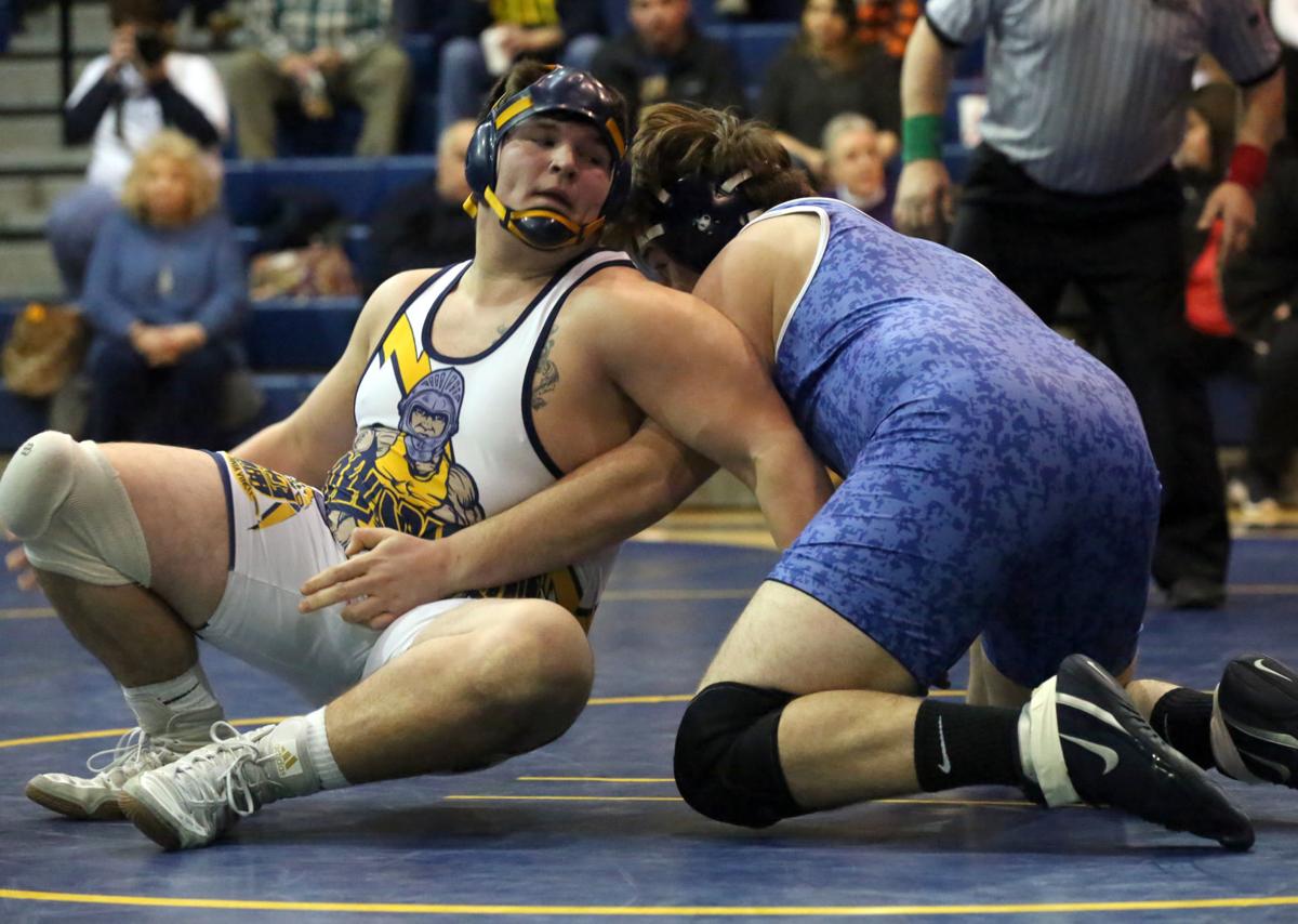Driscoll's late rally sends Holy Spirit wrestling to fourth straight