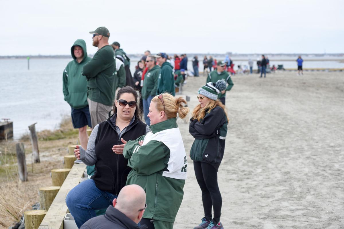 Family and friends gather to watch the First Annual Back Bay Challenge between Mainland and Ocean City’s Boys Crew held at the Dr. John W. Holland Boathouse and along the mile stretch on Harvard Ave. in Ventnor. Dave Griffin / for the Press