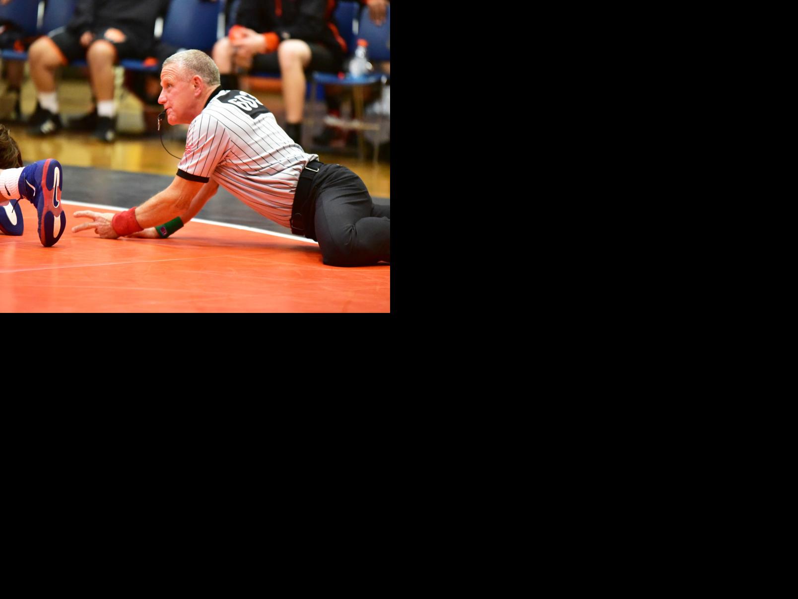Former EHT wrestling coach now on the other side of the mat as referee