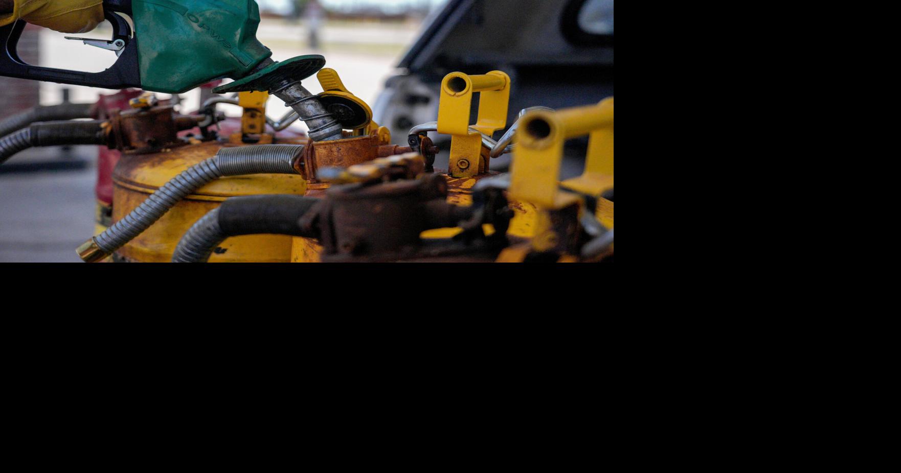 A member of D.H. French Construction fills up cans with Diesel at a 7-Eleven in Oklahoma City, on Thursday, May 7, 2026.