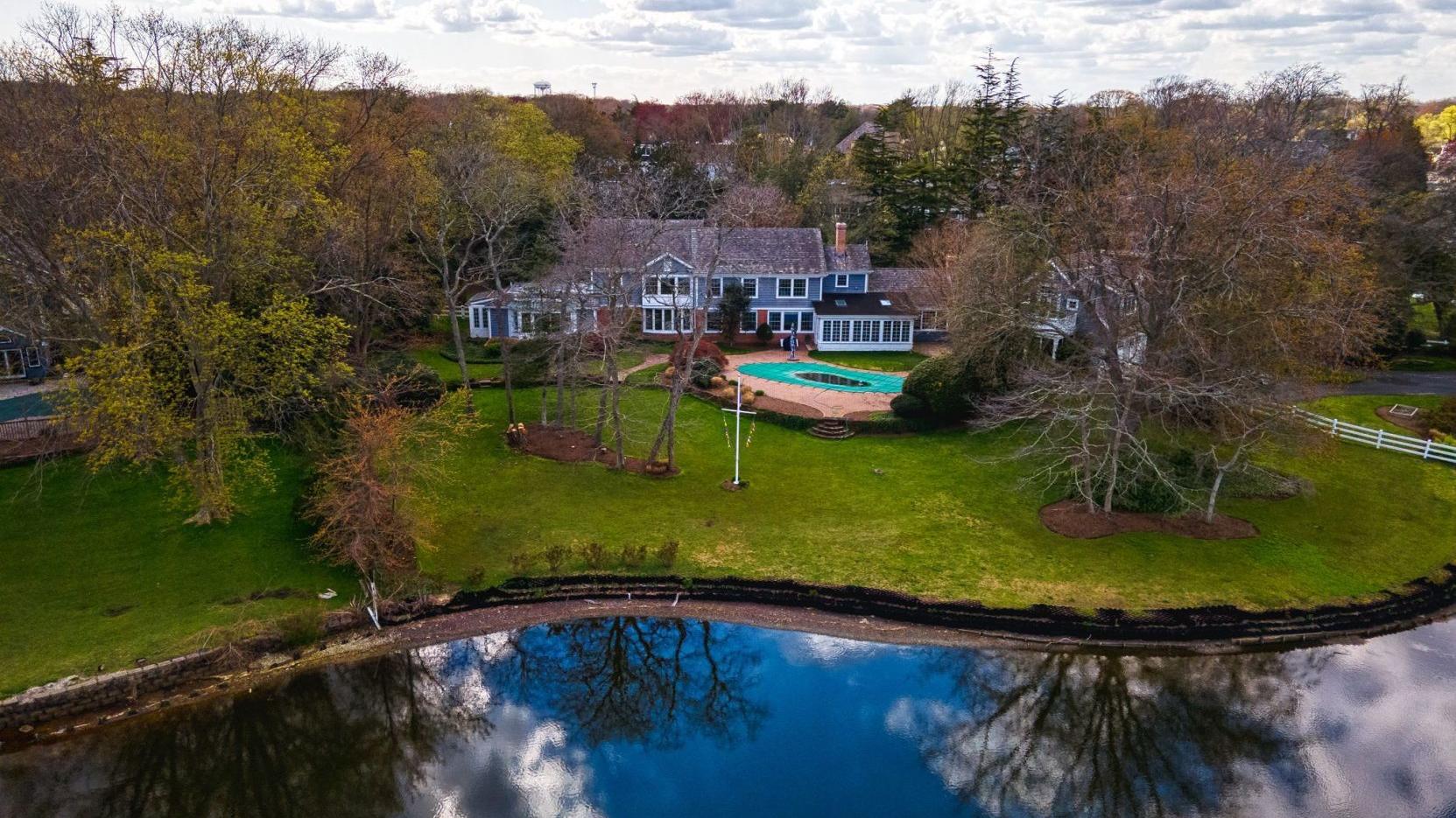 This 15-room Linwood residence is not so much a house as a resort compound — a chateau complete with a chalet