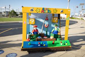 Matty and Mikey Lobley from Deptford display their first-place winning float at the Wildwood Baby Parade