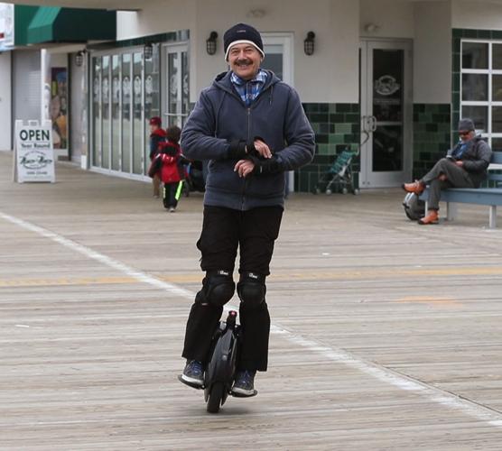 Watch electric unicycles on the Ocean City boardwalk