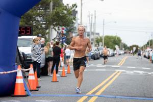 Participants in the Night In Venice 5K Run and 1 Mile Walk at 19th Street in Ocean City, New Jersey
