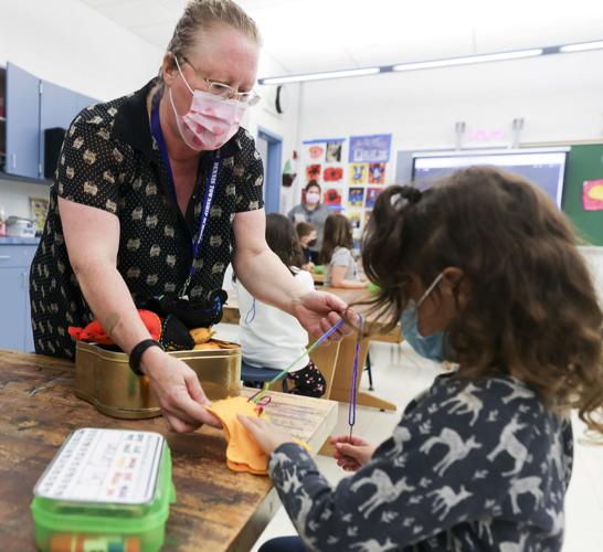 Kindergartners make dog toys for shelter dogs for World Kindness Day