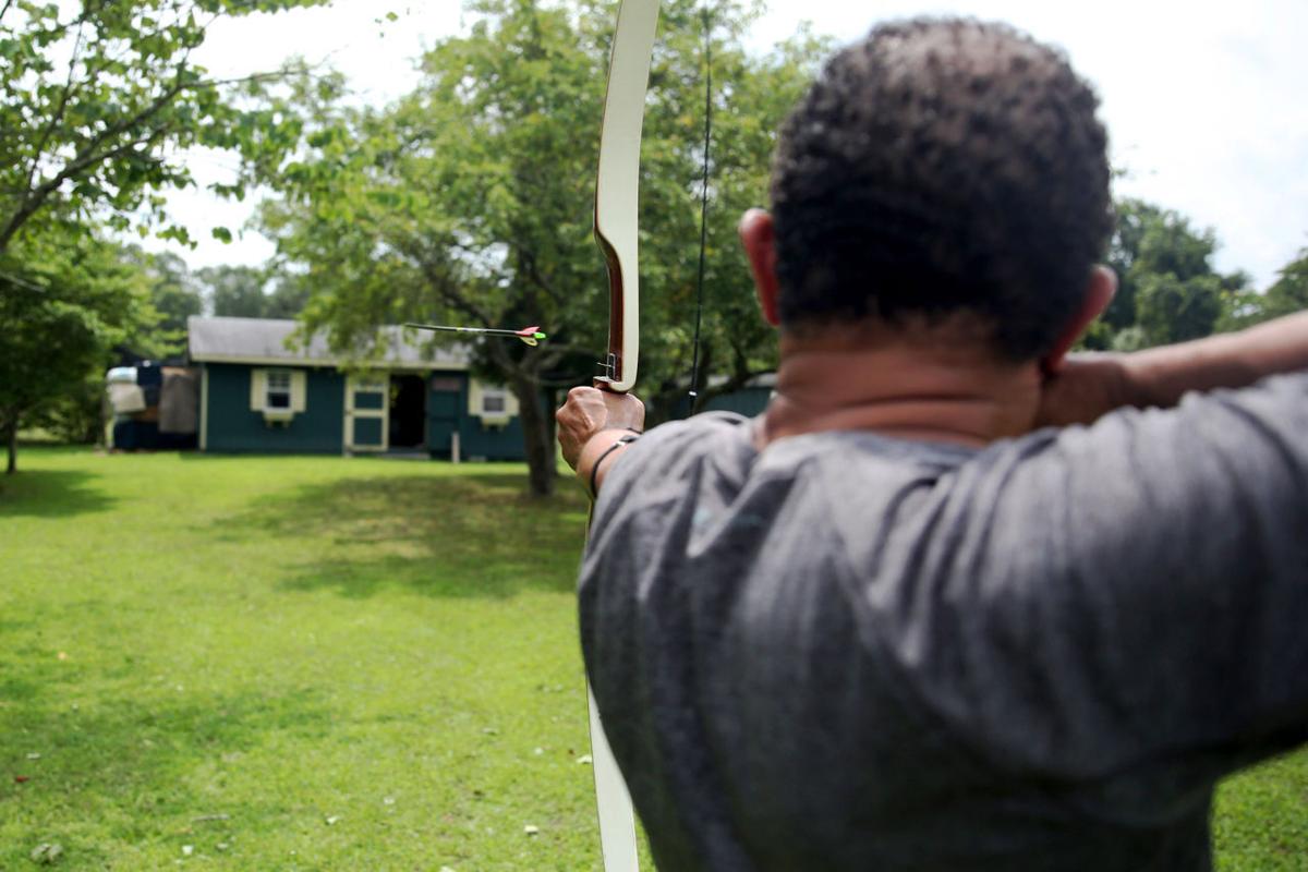 Press Graphic Artist Constructs Archery Range In His Backyard