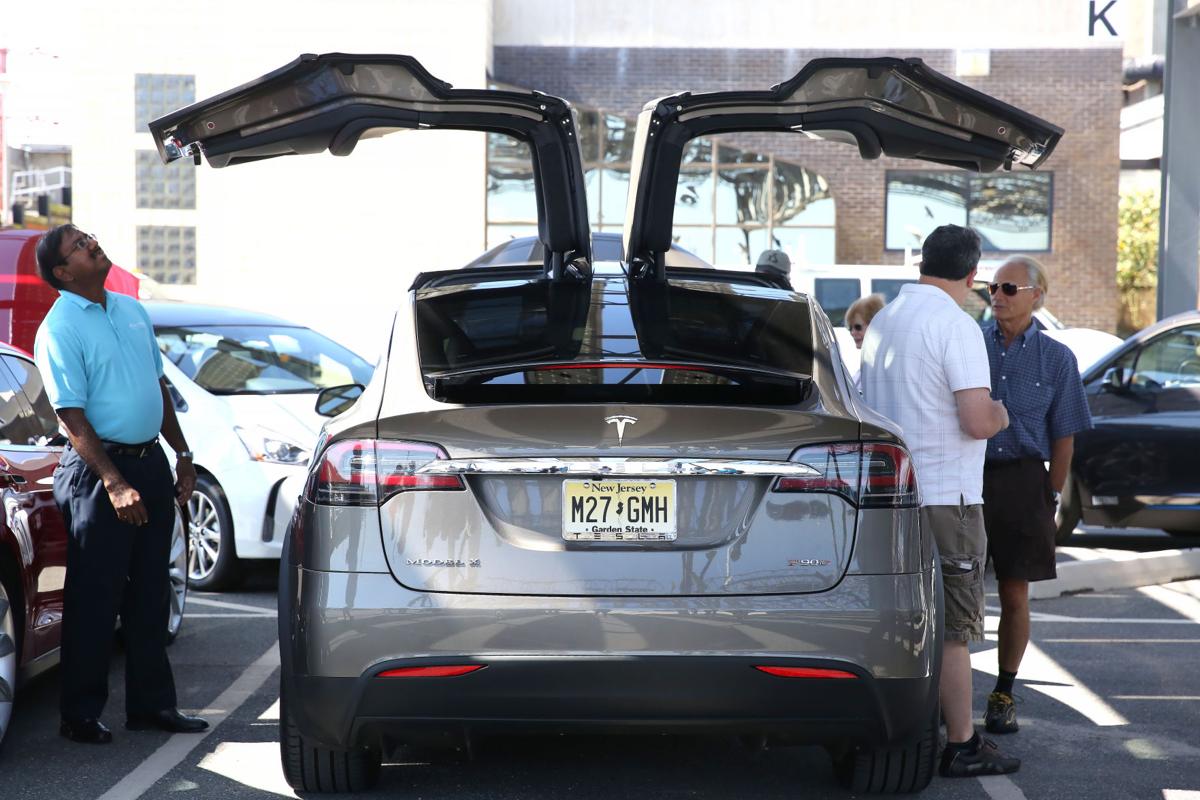Electric Vehicle Owners All Charged Up For Emissions Free Driving