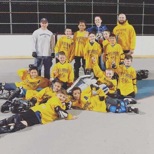 The Mays Landing street hockey teams announce their champions