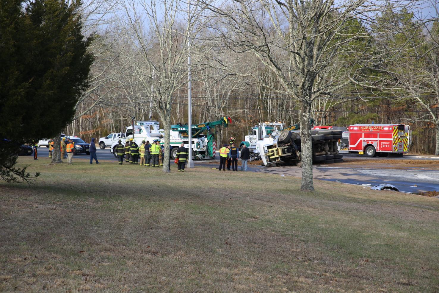 Dump truck overturns onto car on Black Horse Pike in Hamilton Local