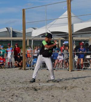 Players and spectators gather on Rio Grande Avenue beach in Wildwood during the MudHen Beach Baseball Tournament