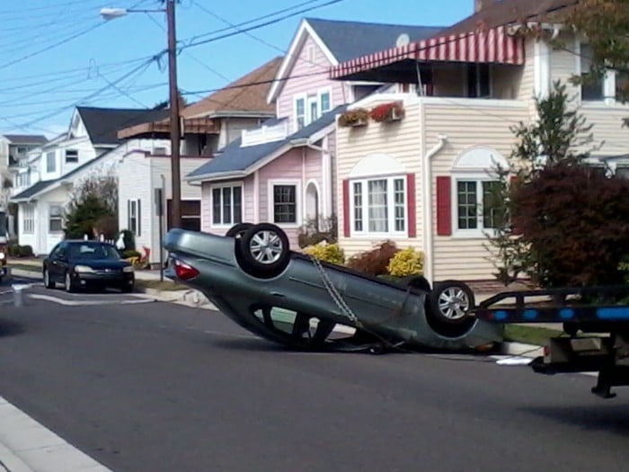 One injured when car overturns after hitting parked car in Margate