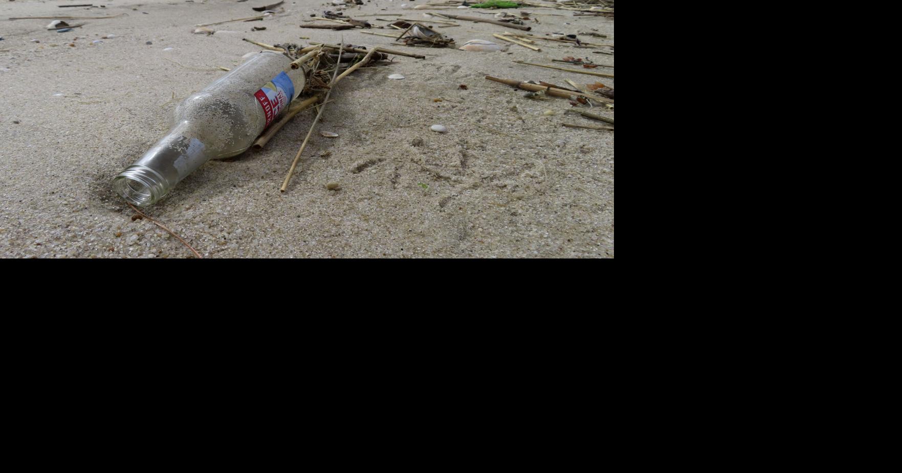 Fishing Nylon Net on the Sand. Garbage on the Beach. Dirty Sea